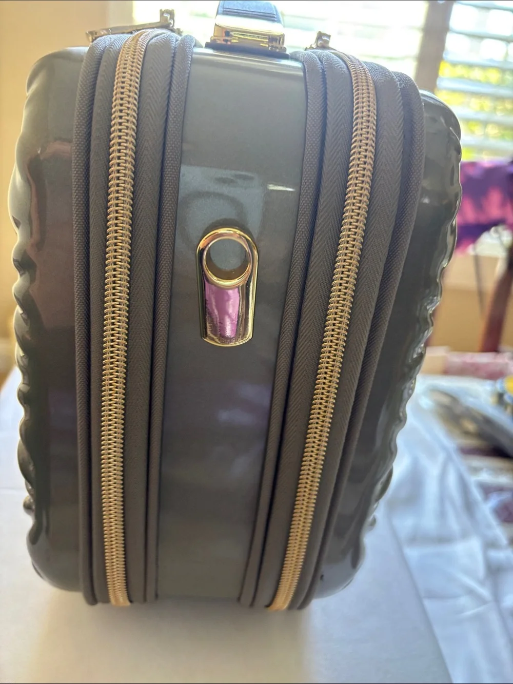 Metallic Gray Quilted Cosmetic Case with Gold Accents